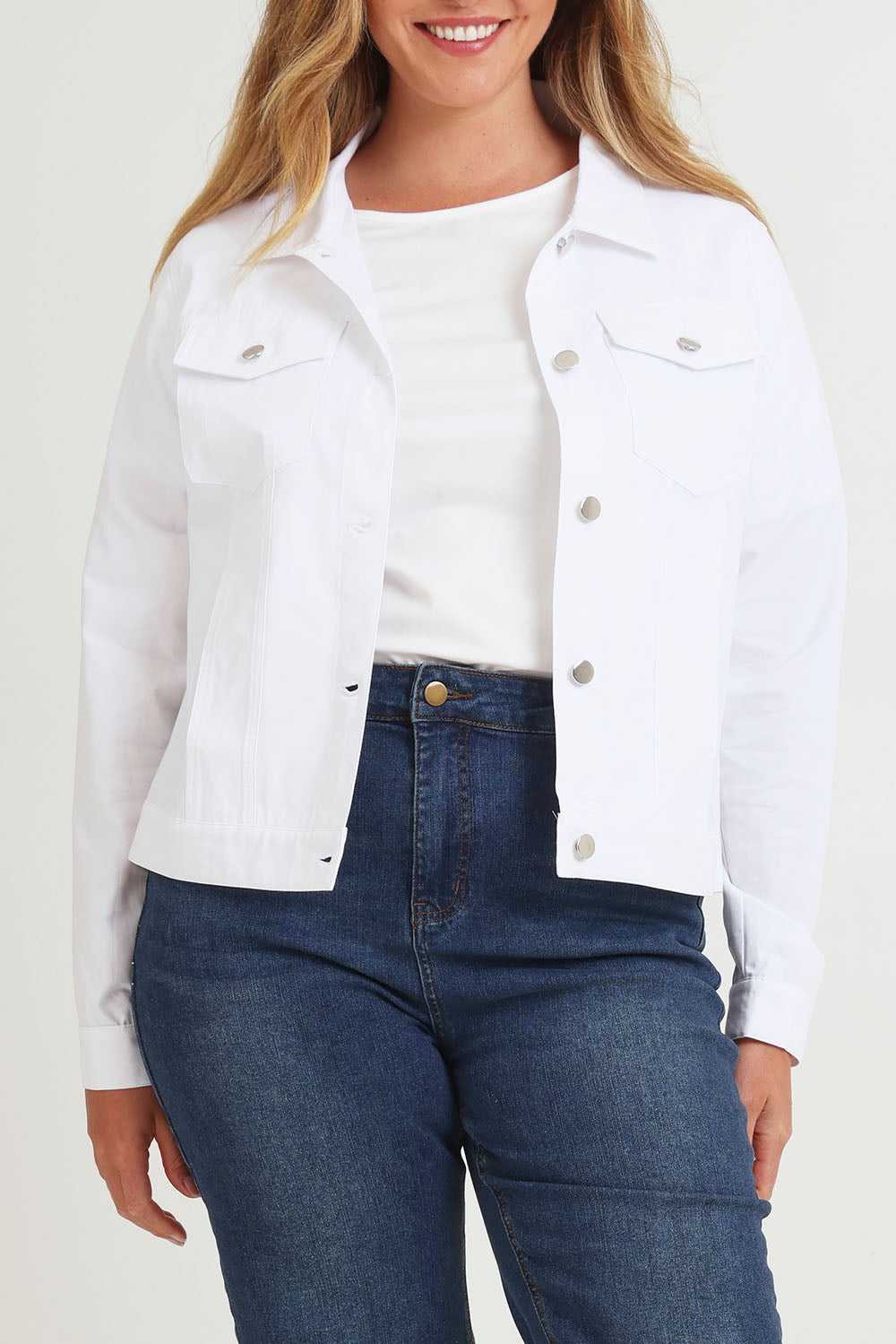 Model Chanel wearing size 16 of The Tencel Blend Denim Jacket in colour White (White), from the front, cropped image