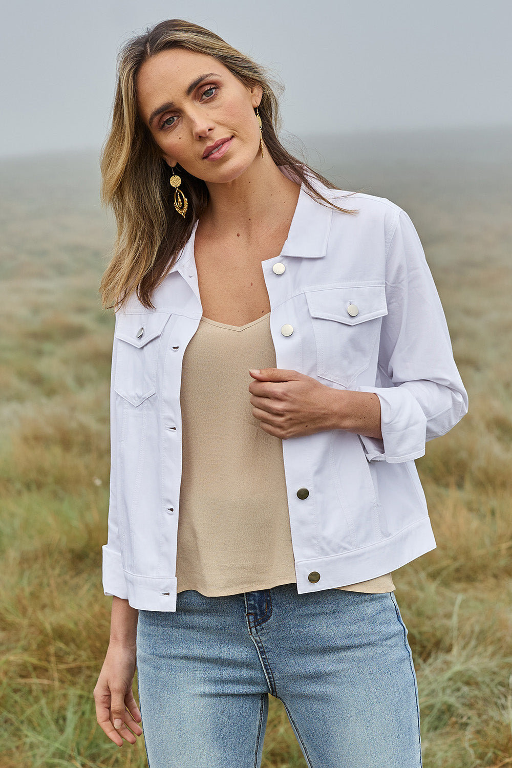 Model Tegan wearing size 10 of The Tencel Blend Denim Jacket in colour White (White), from the front, showing the whole outfit