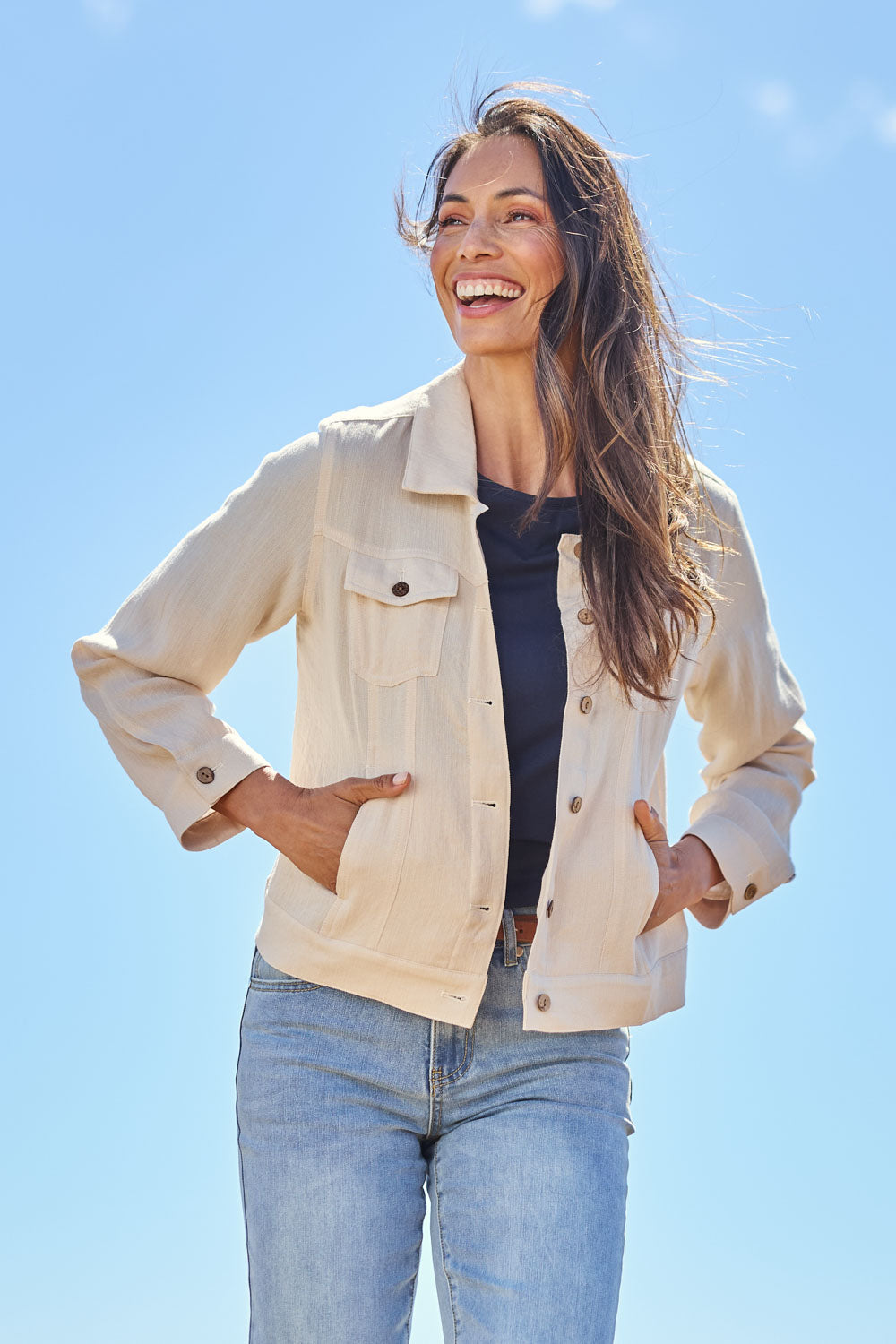 Model Amanda wearing size 10 of The Must Have Linen Look Jacket in colour Sand, from the front, showing the whole outfit
