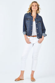 Model Chelsea wearing size 10 of The Denim Jacket in colour Denim (Blue), from the front, showing the whole outfit