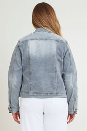 Model Chanel wearing size 16 of The Denim Jacket in colour Lightdenim (Blue), from the back