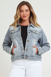 Model Chanel wearing size 16 of The Denim Jacket in colour Lightdenim (Blue), from the front, cropped image