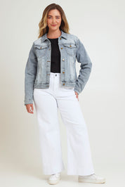 Model Chanel wearing size 16 of The Denim Jacket in colour Lightdenim (Blue), from the front, showing the whole outfit
