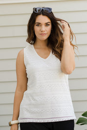 Model Laura wearing size 14 of The V Neck Lace Tank in colour White (White), from the front, showing the whole outfit