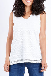 Model Pamela wearing size 10 of The V Neck Lace Tank in colour White (White), from the front, cropped image