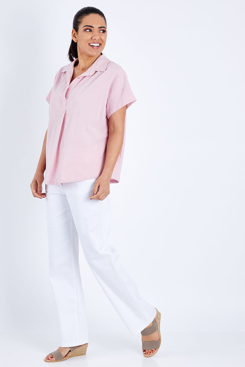 Model Pamela wearing size 10 of The Upcycled Cotton Top in colour Dustypink (Pink), from the front, showing the whole outfit