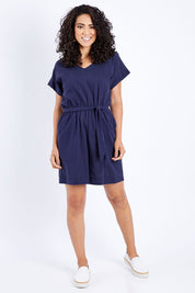 Model Pamela wearing size 10 of The Upcycled Cotton Playsuit in colour Navy (Blue), from the front, showing the whole outfit