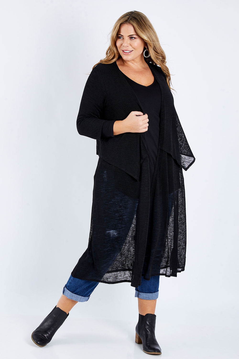 Model Fiona wearing size 16 of The Throw Over Duster Cardi in colour Black (Black), from the front, showing the whole outfit