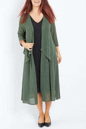 Model Laura wearing size 14 of The Throw Over Duster Cardi in colour Khaki (Green), from the front, cropped image