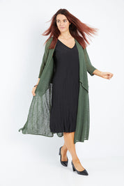 Model Laura wearing size 14 of The Throw Over Duster Cardi in colour Khaki (Green), from the front, showing the whole outfit