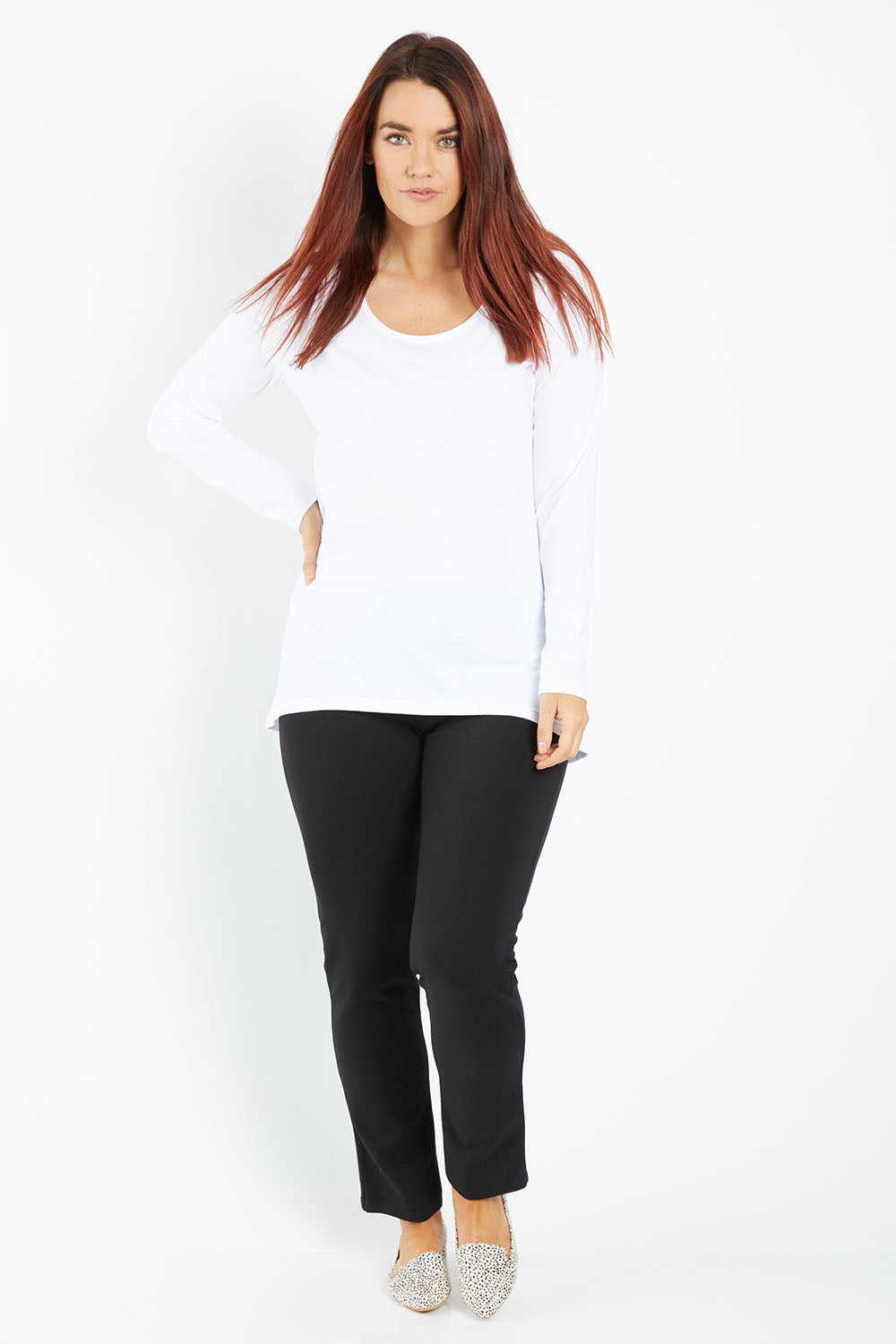 Model Laura wearing size 14 of The Scoop Neck Essential Tee in colour White (White), from the front, showing the whole outfit