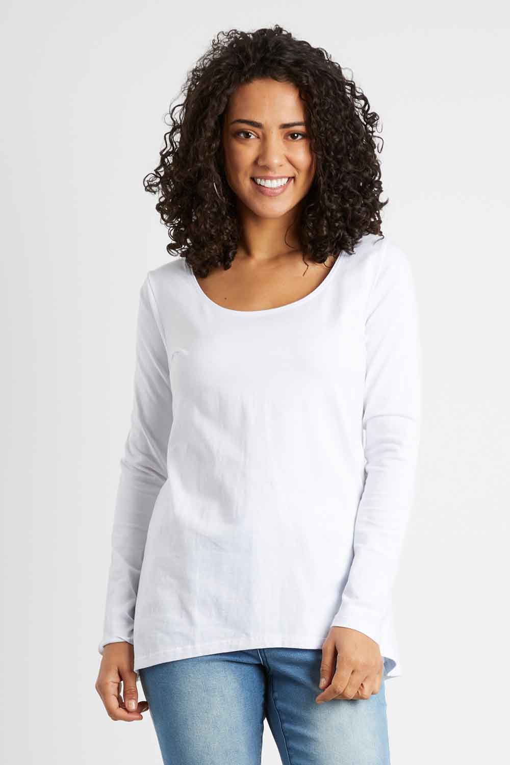 Model Pamela wearing size 10 of The Scoop Neck Essential Tee in colour White (White), from the front, cropped image