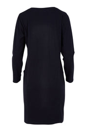 Product shot of The Essential Tunic Top in colour Black (Black), from the back