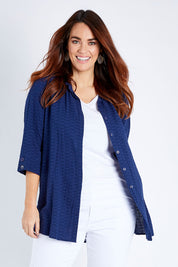Model Laura wearing size 12 of The Textured Overshirt in colour Navy (Blue), from the front, cropped image