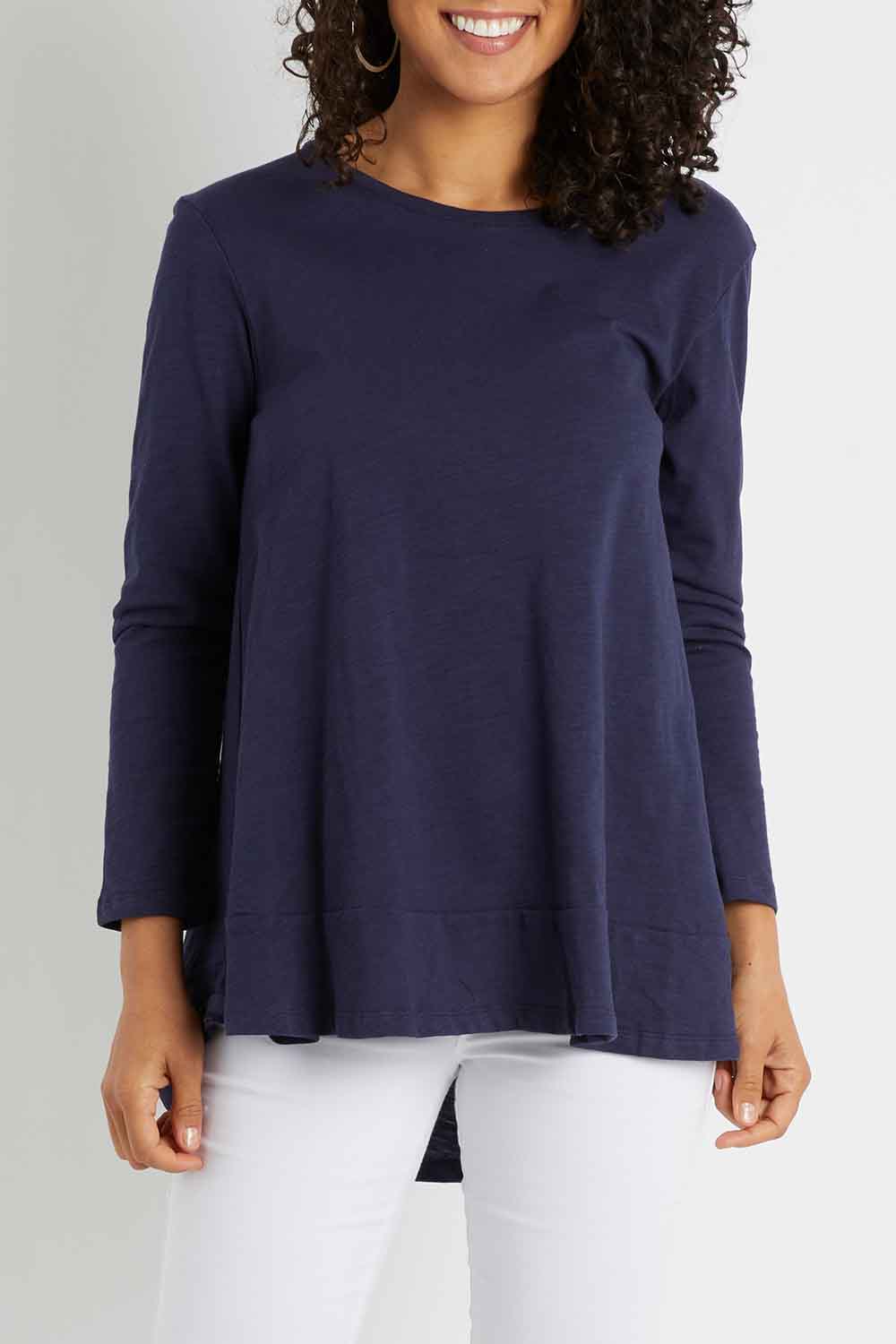 Model Pamela wearing size 10 of The Long Sleeve Swing Tee in colour Navy (Blue), from the front, cropped image