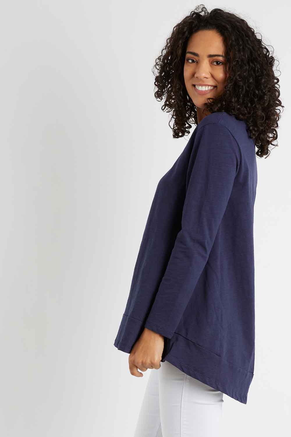 Model Pamela wearing size 10 of The Long Sleeve Swing Tee in colour Navy (Blue), from the front, cropped image