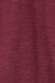 Product shot of The Long Sleeve Swing Tee in colour Shiraz (Red), detail