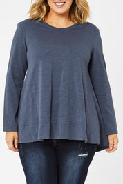 Model Jess wearing size 14 of The Long Sleeve Swing Tee in colour Slate (Grey), from the front, cropped image
