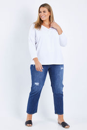 Model Fiona wearing size 16 of The V Neck Split Back Top in colour White (White), from the front, showing the whole outfit