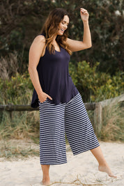 Model Laura wearing size 14 of The Summer Vintage Wash Pant in colour Stripe (Blue), from the front, showing the whole outfit