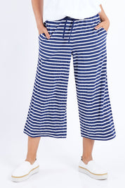 Model Pamela wearing size 10 of The Summer Vintage Wash Pant in colour Stripe (Blue), from the front, cropped image