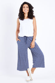 Model Pamela wearing size 10 of The Summer Vintage Wash Pant in colour Stripe (Blue), from the front, showing the whole outfit
