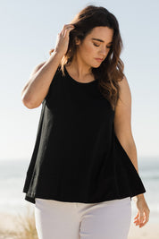 Model Laura wearing size 14 of The Swing Tank in colour Black (Black), from the front, showing the whole outfit