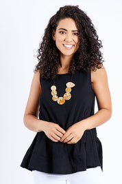 Model Pamela wearing size 10 of The Swing Tank in colour Black (Black), from the front, cropped image