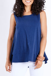 Model Pamela wearing size 10 of The Swing Tank in colour Navy (Blue), from the front, cropped image