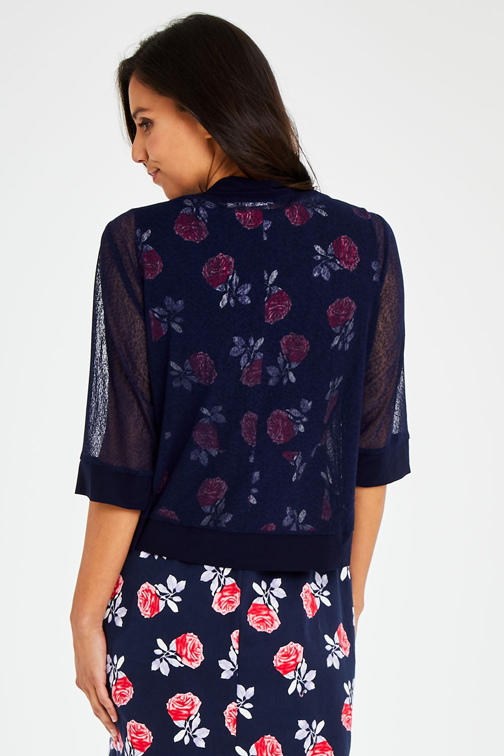 Model Vitoria wearing size 10 of The Summer Shrug in colour Navy (Blue), from the back