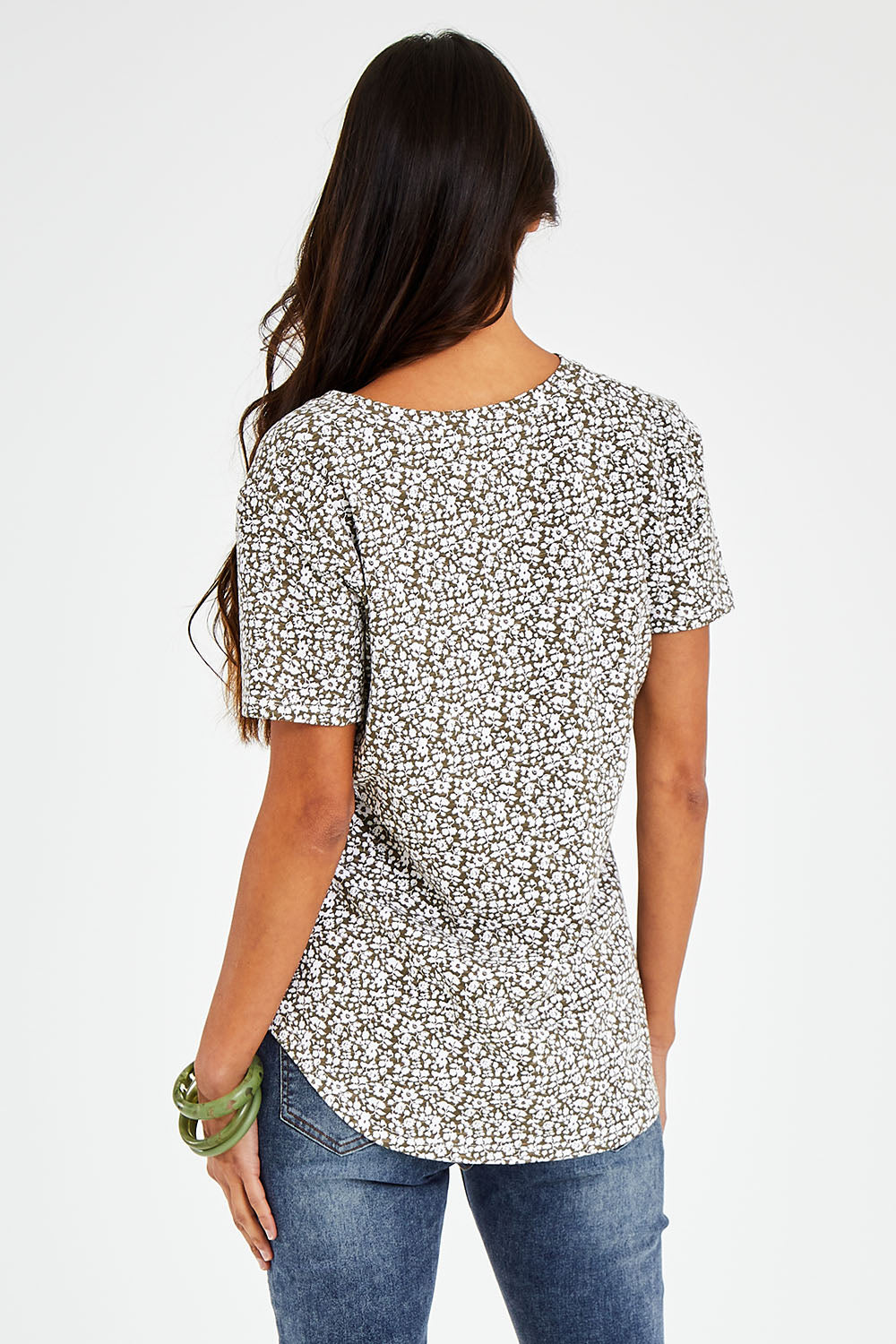 Model Vitoria wearing size 10 of The Feeling Spotty Tee in colour Khaki (Green), from the back