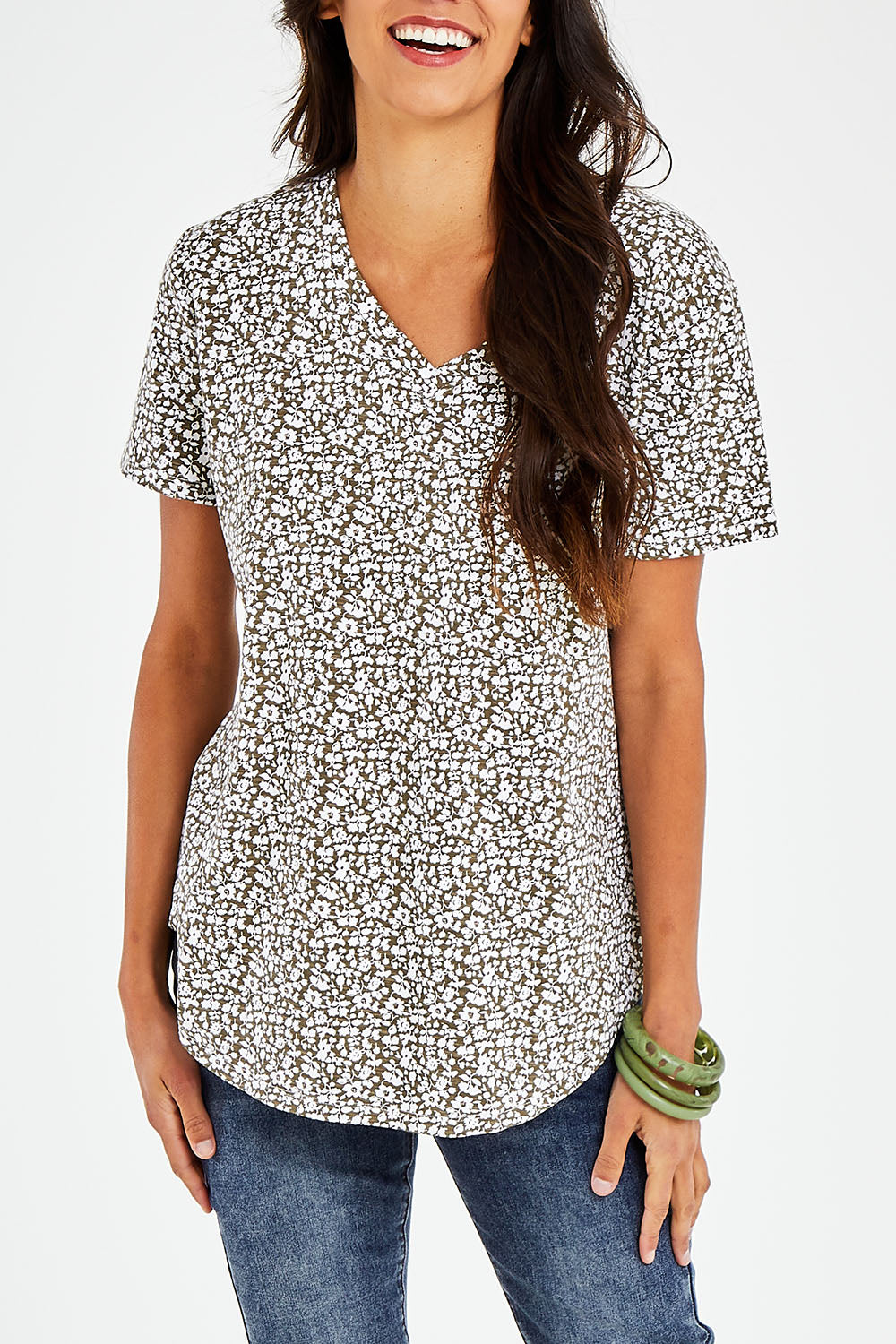 Model Vitoria wearing size 10 of The Feeling Spotty Tee in colour Khaki (Green), from the front, cropped image