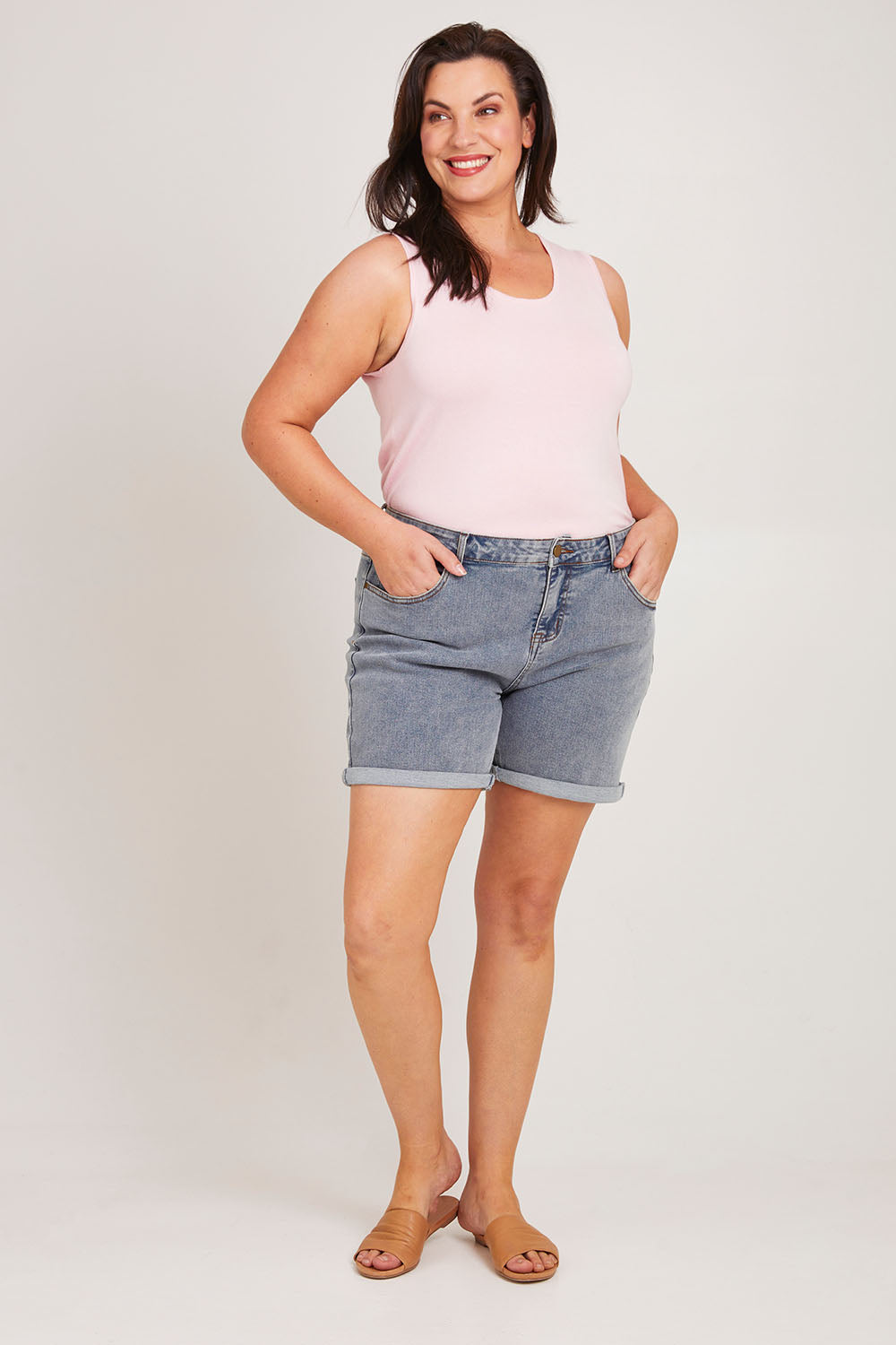 Model Poppy wearing size 16 of The 5 Pocket Denim Short in colour Lightdenim (Blue), from the front, showing the whole outfit