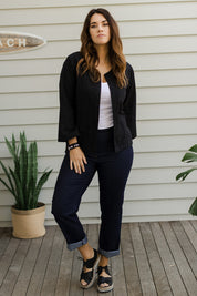 Model Laura wearing size 14 of The Essential 5 Pocket Slim Jean in colour Darkdenim (Blue), from the front, showing the whole outfit