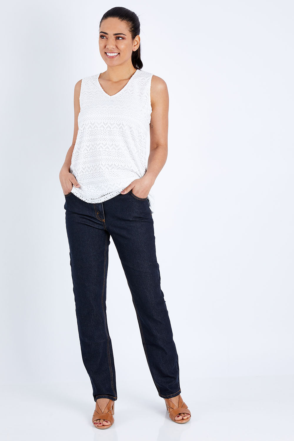 Model Pamela wearing size 10 of The Essential 5 Pocket Slim Jean in colour Darkdenim (Blue), from the front, showing the whole outfit