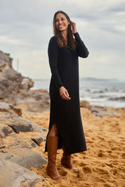 Model Amanda wearing size S of The Comfort True Knit Dress in colour Black (Black), from the front, showing the whole outfit