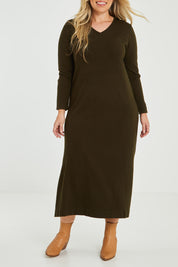 Model Katie wearing size XL of The Comfort True Knit Dress in colour Darkolive (Green), from the front, cropped image