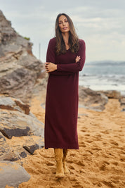 Model Amanda wearing size S of The Comfort True Knit Dress in colour Shiraz (Red), from the front, showing the whole outfit