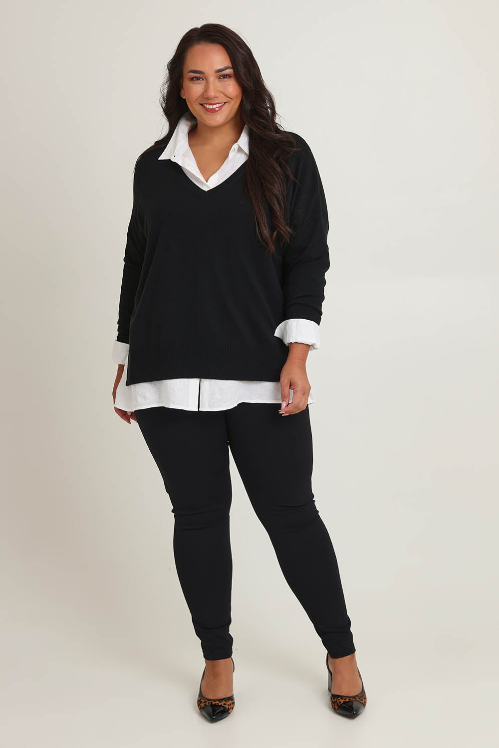 Model Ashleigh wearing size 16 of The Essential Ponte Legging in colour Black (Black), from the front, showing the whole outfit