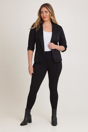 Model Chanel wearing size 16 of The Essential Ponte Legging in colour Black (Black), from the front, showing the whole outfit