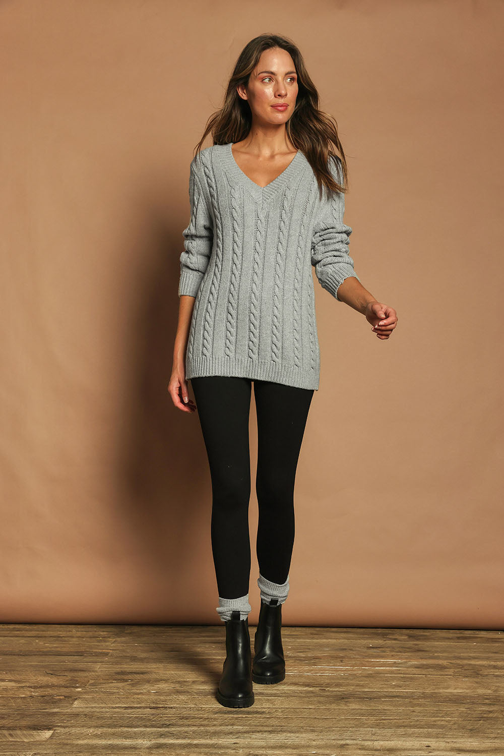 Model Madeline wearing size 10 of The Essential Ponte Legging in colour Black (Black), from the front, showing the whole outfit