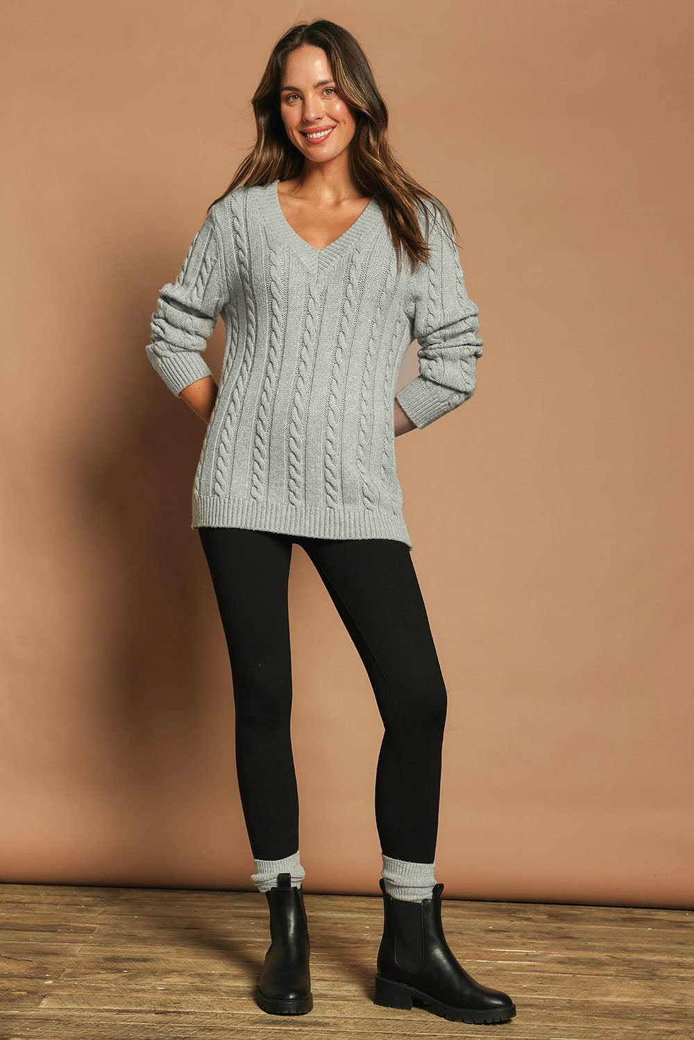 Model Madeline wearing size 10 of The Essential Ponte Legging in colour Black (Black), from the front, showing the whole outfit