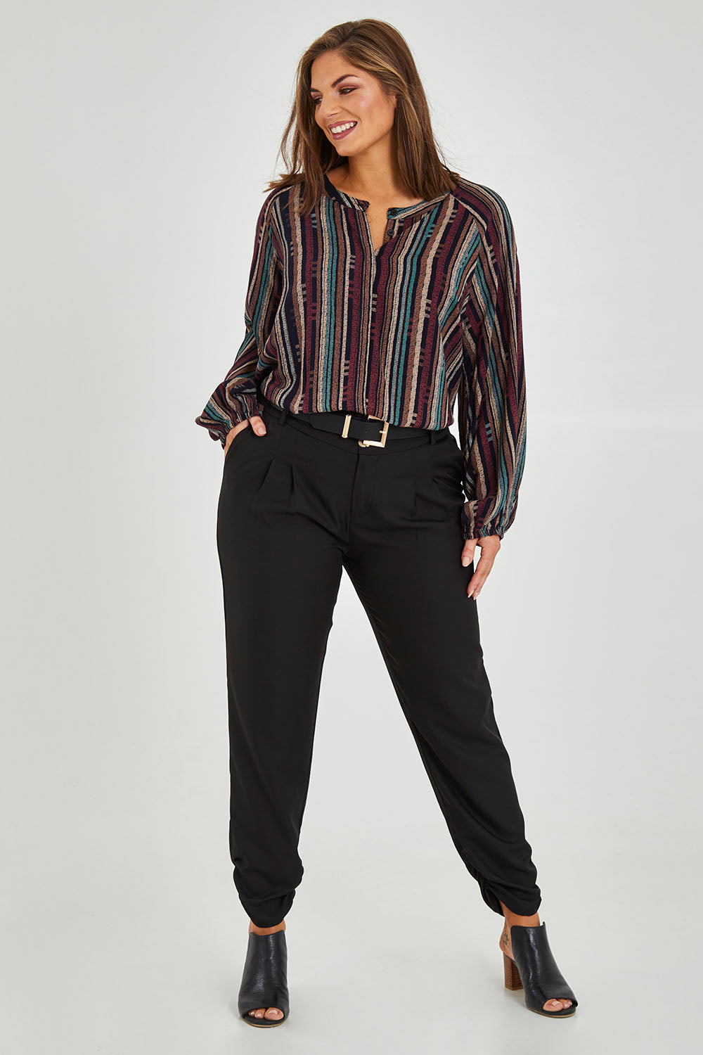 Model Monique wearing size 14 of The Full Length Best Seller Pant in colour Black (Black), from the front, showing the whole outfit