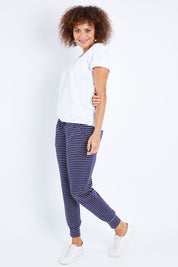 Model Lala wearing size 10 of The Shell Tee in colour White (White), from the front, showing the whole outfit
