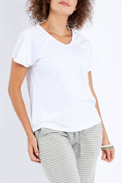 Model Lala wearing size 10 of The Slouch Tee in colour White (White), from the front, cropped image