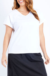 Model Laura wearing size 14 of The Slouch Tee in colour White (White), from the front, cropped image