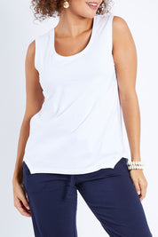 Model Lala wearing The Step Hem Tank in colour White (White), from the front, cropped image