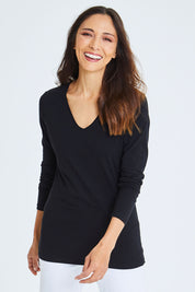 Model Cara wearing size 10 of The Long Sleeve V Neck Tee in colour Black (Black), from the front, cropped image
