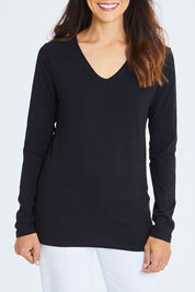 Model Cara wearing size 10 of The Long Sleeve V Neck Tee in colour Black (Black), from the front, cropped image
