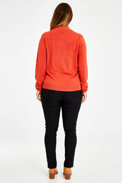 Model Laura wearing size L of The Essential Soft Jumper in colour Ginger, from the back